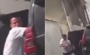 Grabación de jugadores del Junior bajando canastas de cerveza de sus vehículos.