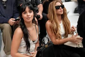 Camila Cabello, left, and Shakira attend the Fendi Haute Couture Fall/winter 2023-2024 fashion collection presented in Paris, Thursday, July 6, 2023. (AP Photo/Christophe Ena)