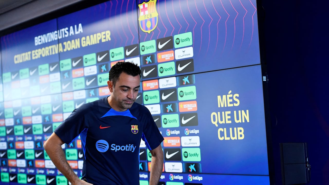 FC Barcelona's Spanish coach Xavi leaves after addressing a press conference on the eve of their Spanish League football match against Real Madrid at the Joan Gamper training ground in Sant Joan Despi, near Barcelona on October 15, 2022. (Photo by Pau BARRENA / AFP)