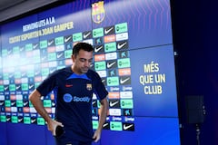 FC Barcelona's Spanish coach Xavi leaves after addressing a press conference on the eve of their Spanish League football match against Real Madrid at the Joan Gamper training ground in Sant Joan Despi, near Barcelona on October 15, 2022. (Photo by Pau BARRENA / AFP)