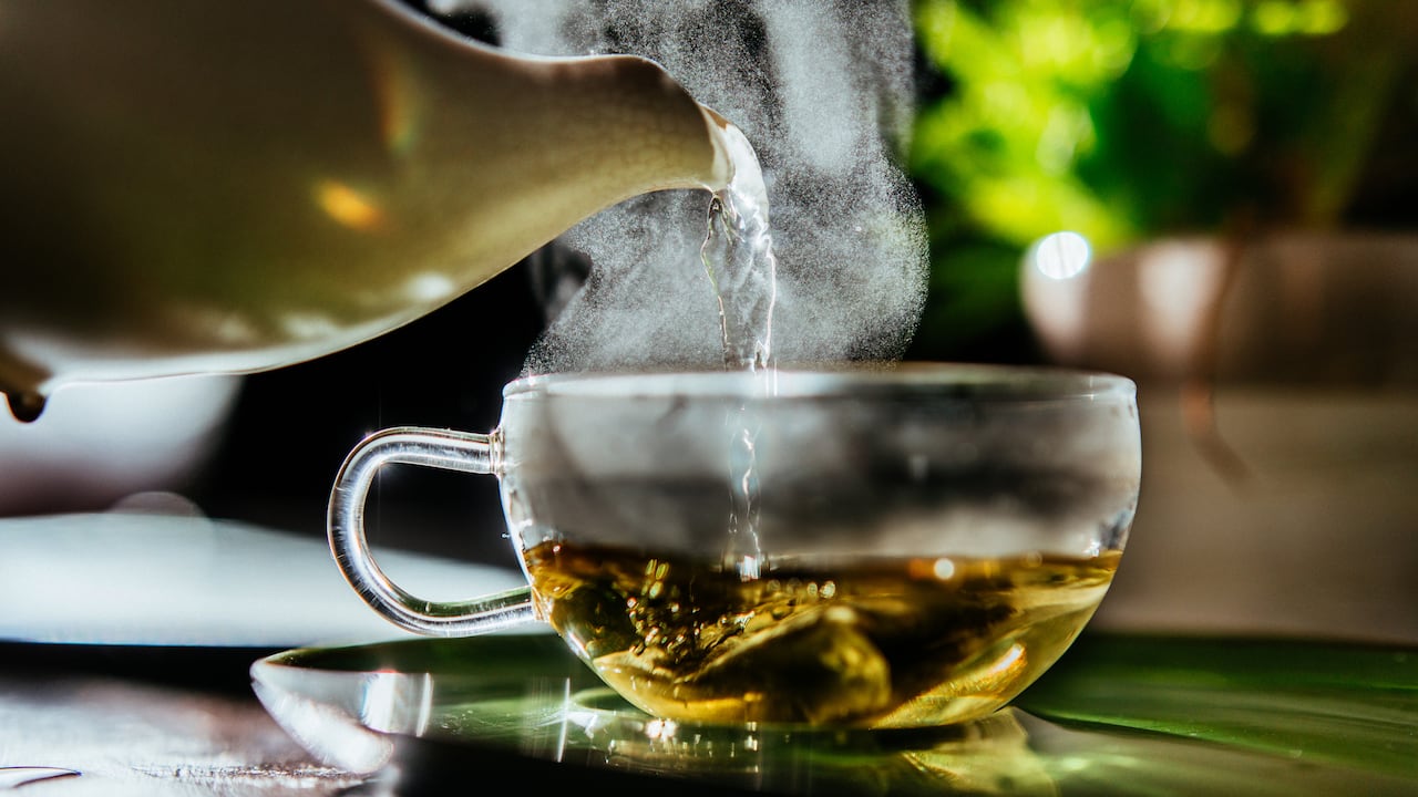 Fresh hot water for organic sage herbal tea at teatime.