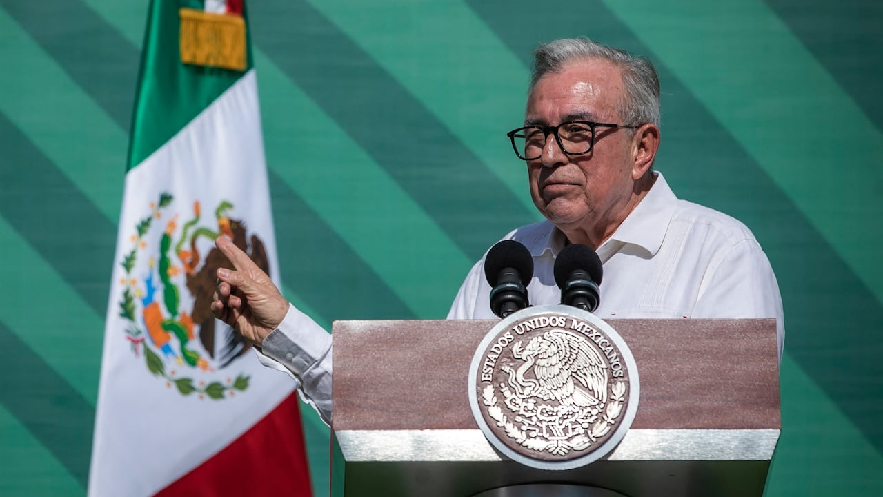 (FILES) Sinaloa Governor Ruben Rocha Moya (R) speaks next to Mexican President Andres Manuel Lopez Obrador during AMLO's daily morning press conference, in Mazatlan, Sinaloa State, Mexico, on April 8, 2024. The US Justice Department accused the governor of the Mexican state of Sinaloa, Ruben Rocha Moya, of narcotrafficking in a statement from the Southern District Court of New York City on April 29, 2026. (Photo by Rashide FRIAS / AFP)