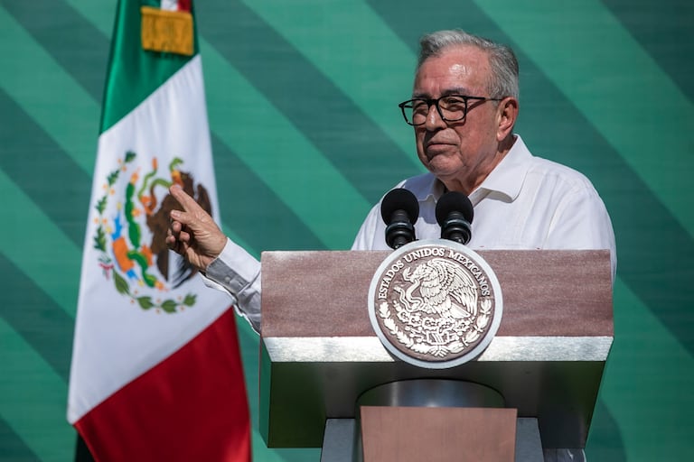 (FILES) Sinaloa Governor Ruben Rocha Moya (R) speaks next to Mexican President Andres Manuel Lopez Obrador during AMLO's daily morning press conference, in Mazatlan, Sinaloa State, Mexico, on April 8, 2024. The US Justice Department accused the governor of the Mexican state of Sinaloa, Ruben Rocha Moya, of narcotrafficking in a statement from the Southern District Court of New York City on April 29, 2026. (Photo by Rashide FRIAS / AFP)