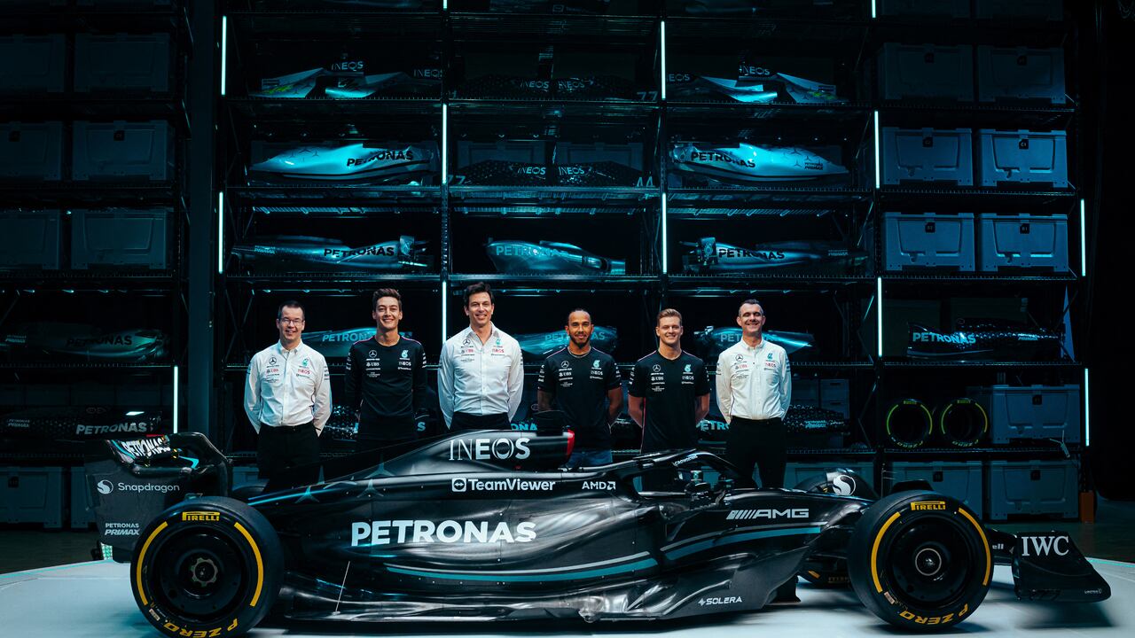 A handout image released by Mercedes shows the team's British driver George Russell (2L), Team principal Toto Wolff (3L), British driver Lewis Hamilton (3R) and reserve driver German driver Mick Schumacher (2R) posing with their new Mercedes-AMG F1 W14 E Formula One racing car during their 2023 season launch, in Silverstone on February 15, 2023. (Photo by MERCEDES / AFP) / RESTRICTED TO EDITORIAL USE - MANDATORY CREDIT "AFP PHOTO / MERCEDES-AMG" - NO MARKETING - NO ADVERTISING CAMPAIGNS - DISTRIBUTED AS A SERVICE TO CLIENTS