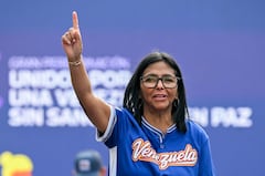 Venezuela's acting president Delcy Rodriguez gestures during a march calling for the lifting of all US sanctions in Caracas on April 30, 2026. Delcy Rodriguez announced on April 30 a 26% wage increase to the so-called "integral minimum income," raising it from 190 dollars to 240 dollars per month, the first adjustment since Nicolas Maduro's fall. (Photo by Juan BARRETO / AFP)