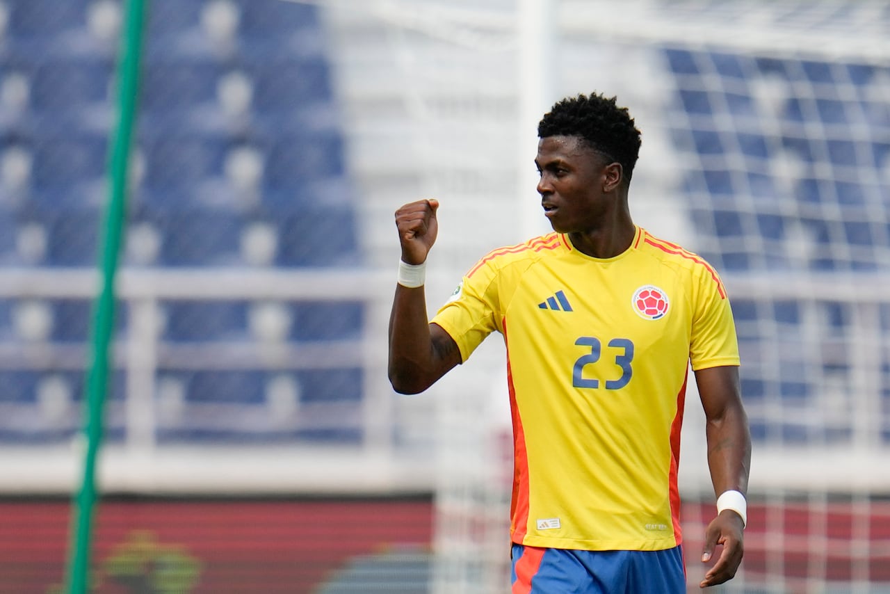 Colombia's Neiser Villarreal celebrates scoring his side's opening goal against Uruguay during a South American U-20 Championship final round soccer match in Puerto La Cruz, Venezuela, Sunday, Feb. 16, 2025. (AP Photo/Matias Delacroix)