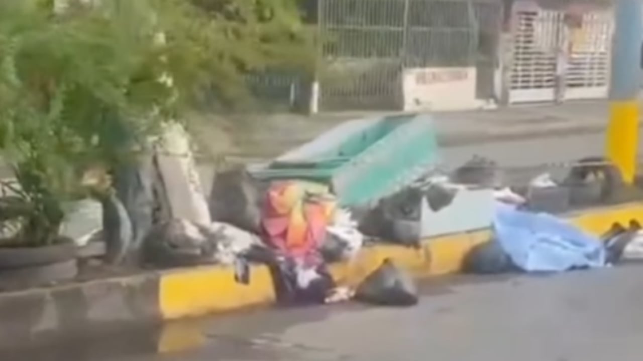 El cuerpo se encontraba en la carrera 34 en medio de las basuras.
