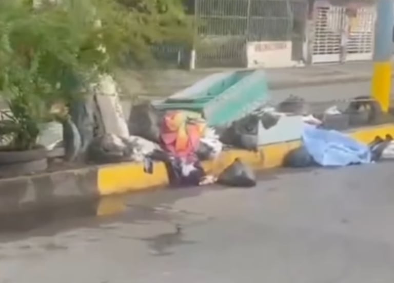 El cuerpo se encontraba en la carrera 34 en medio de las basuras.