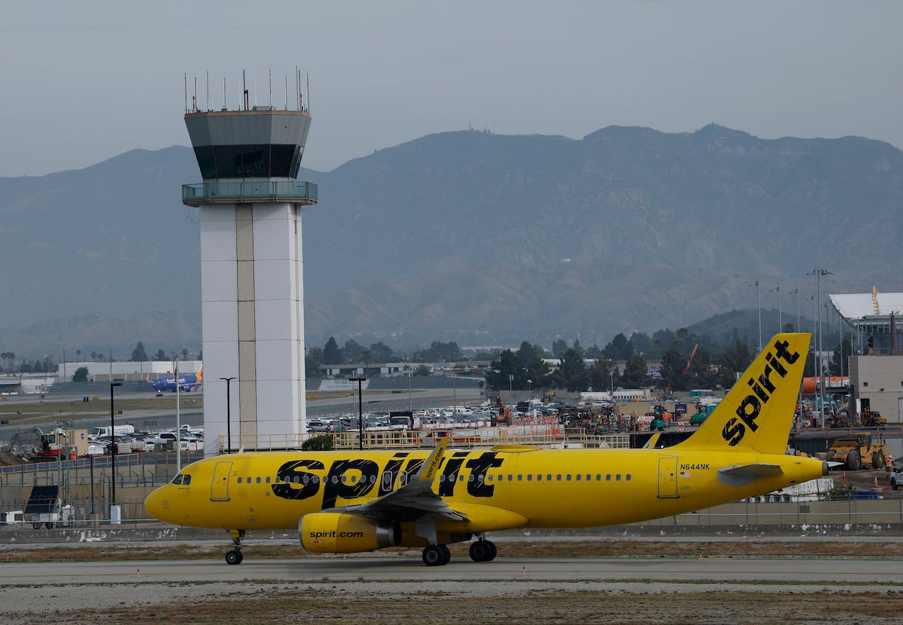 BURBANK, CALIFORNIA - APRIL 16: A Spirit Airlines plane taxis at Hollywood Burbank Airport on April 16, 2026 in Burbank, California. Facing mounting financial pressure, Spirit Airlines is at risk of liquidation within days as surging jet fuel costs tied to the Iran conflict strain its already fragile bankruptcy restructuring efforts. Justin Sullivan/Getty Images/AFP (Photo by JUSTIN SULLIVAN / GETTY IMAGES NORTH AMERICA / Getty Images via AFP)