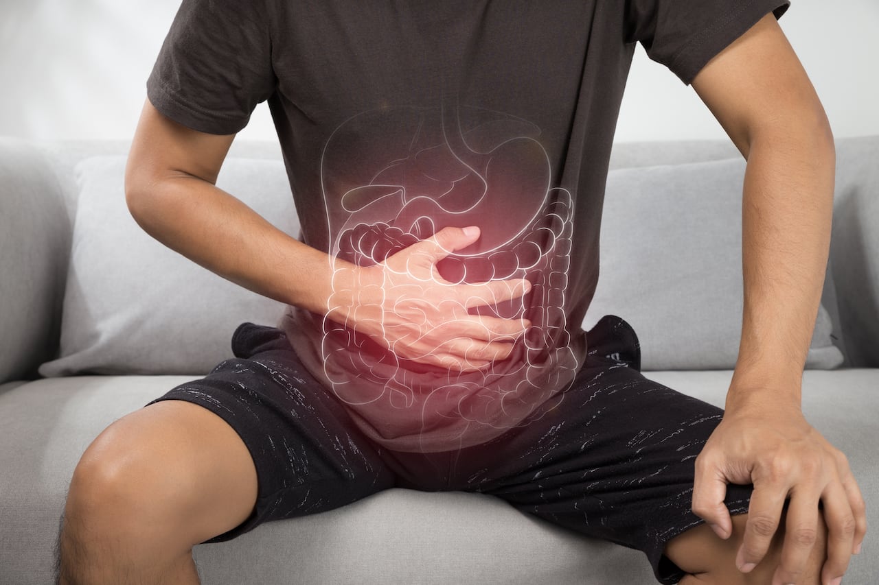 Illustration of internal organs is on the man body.
