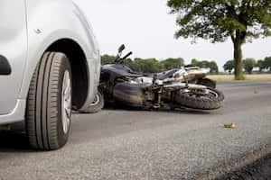 Motorbike Accident on the road with a car