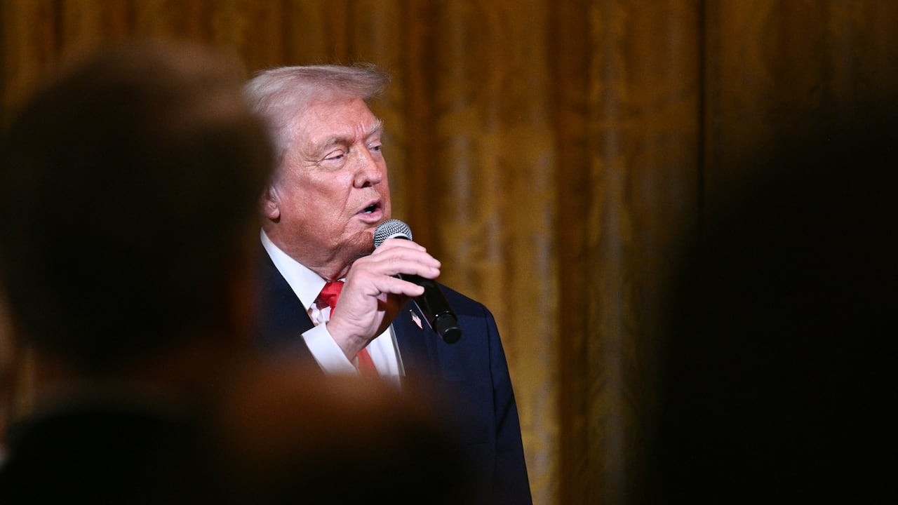 US President Donald Trump delivers remarks before attending a concert by Italian tenor Andrea Bocelli in the East Room of the White House in Washington, DC on December 5, 2025. (Photo by Brendan SMIALOWSKI / AFP)