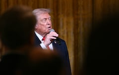 US President Donald Trump delivers remarks before attending a concert by Italian tenor Andrea Bocelli in the East Room of the White House in Washington, DC on December 5, 2025. (Photo by Brendan SMIALOWSKI / AFP)
