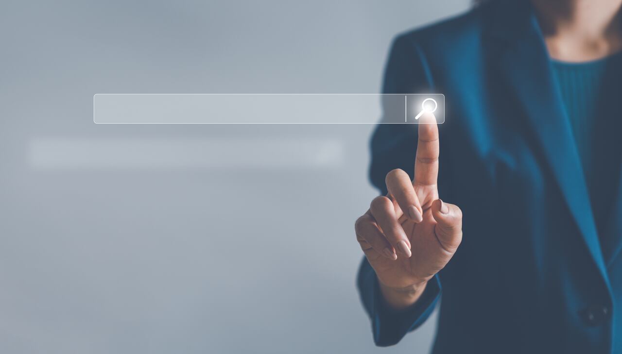 Data Search Technology Search Engine Optimization. woman's hands touch virtual screen Search Magnifier icon to Searching for information. Using Search Console with your website.