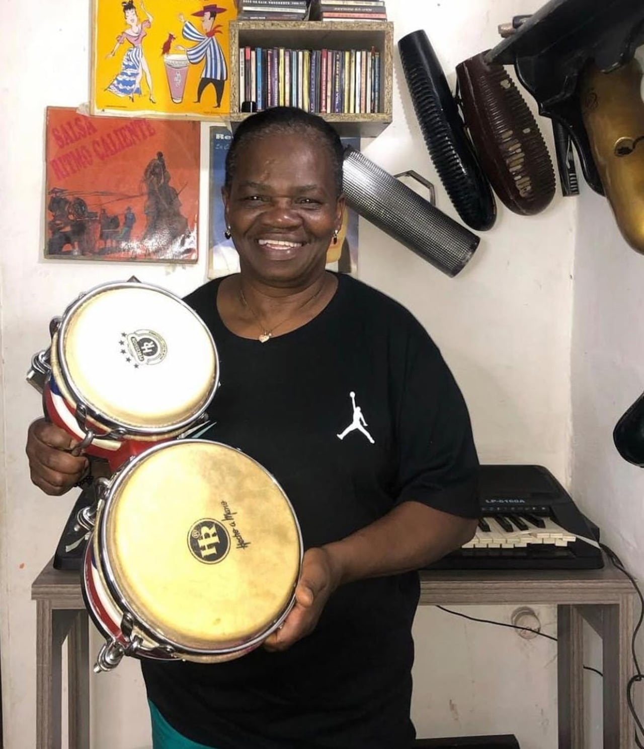 Aunque su nombre era Aura Mariela, se dio a conocer entre los salseros como la 'Tía Mariela', dueña de un gran carisma y sabor.