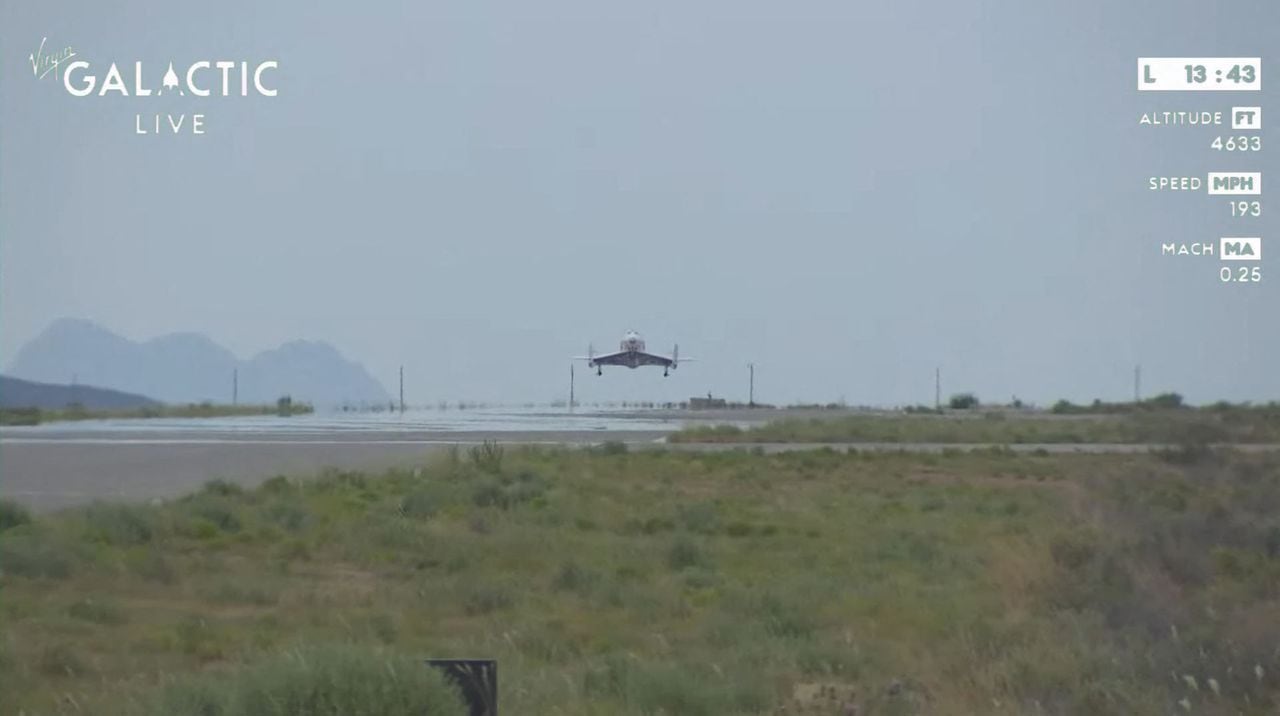 This still image from a Virgin Galactic video shows the Galactic 01 mission spacecraft returning to Earth after the first commercial flight from Spaceport City in New Mexico on June 29, 2023. Virgin Galactic on June 29 began commercial spaceflights, a major milestone for the company founded in 2004 by British billionaire Richard Branson. Its first paying customers are a three-member crew from the Italian Air Force and National Research Council of Italy, with a fourth seat occupied by a Virgin Galactic astronaut instructor. (Photo by Handout / Virgin Galactic / AFP) / RESTRICTED TO EDITORIAL USE - MANDATORY CREDIT "AFP PHOTO / Virgin Galactic" - NO MARKETING NO ADVERTISING CAMPAIGNS - DISTRIBUTED AS A SERVICE TO CLIENTS