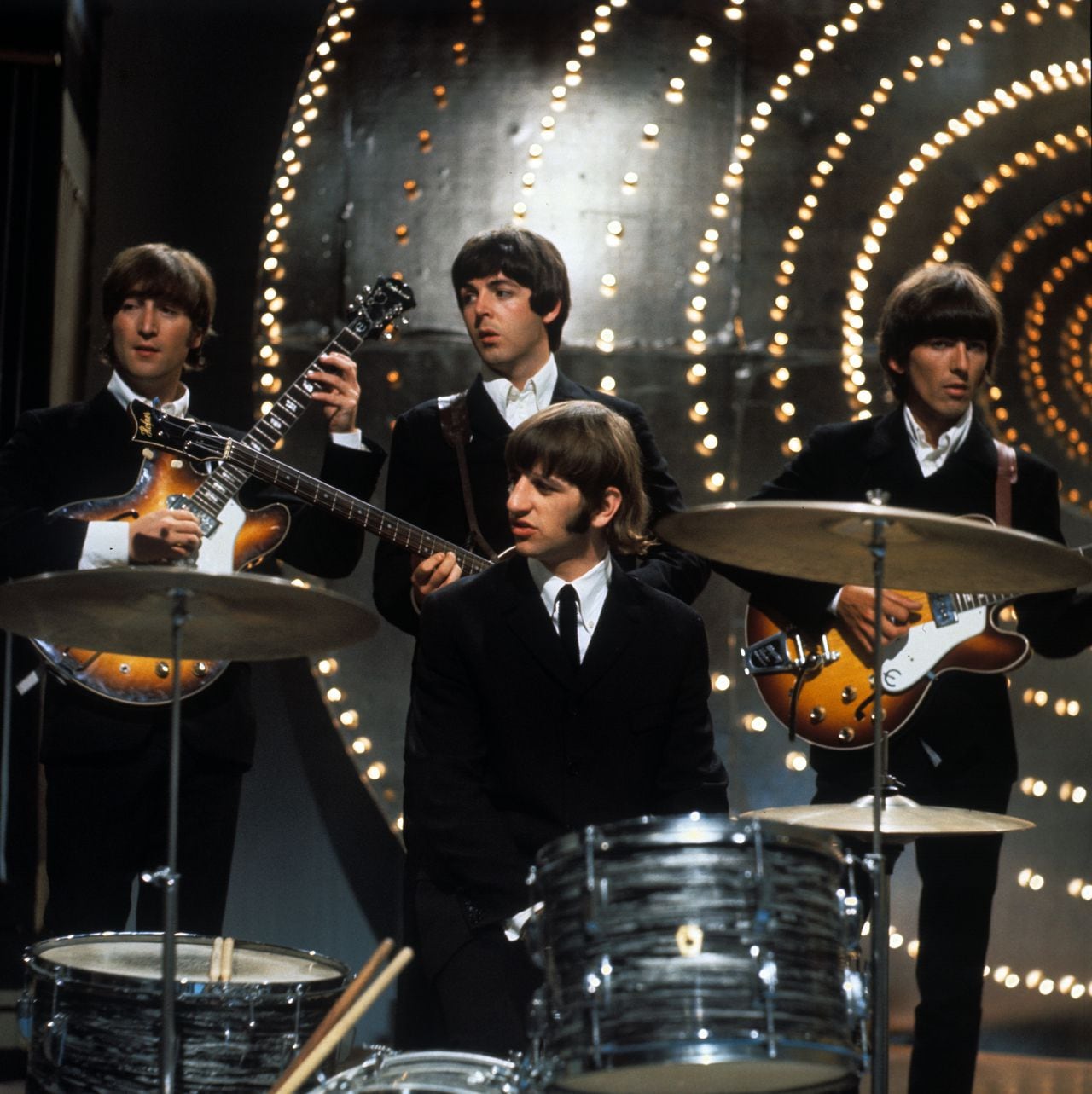 The Beatles en concierto en 1966.
