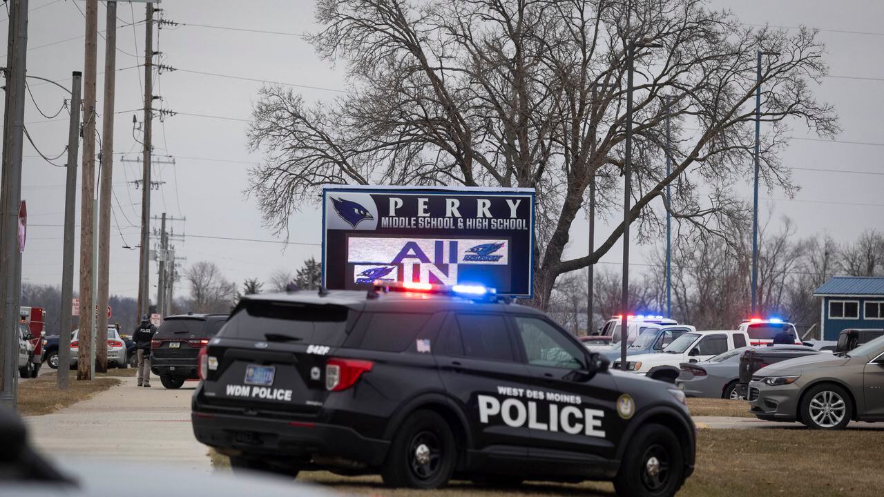 Law enforcement officials patrol the Perry Middle School and High School complex during a shooting on January 4, 2024, in Perry, Iowa. A shooting on Thursday at the high school in Perry left "multiple gunshot victims," local authorities said, adding the incident was over but without confirming if anyone had been killed. (Photo by Christian Monterrosa / AFP)