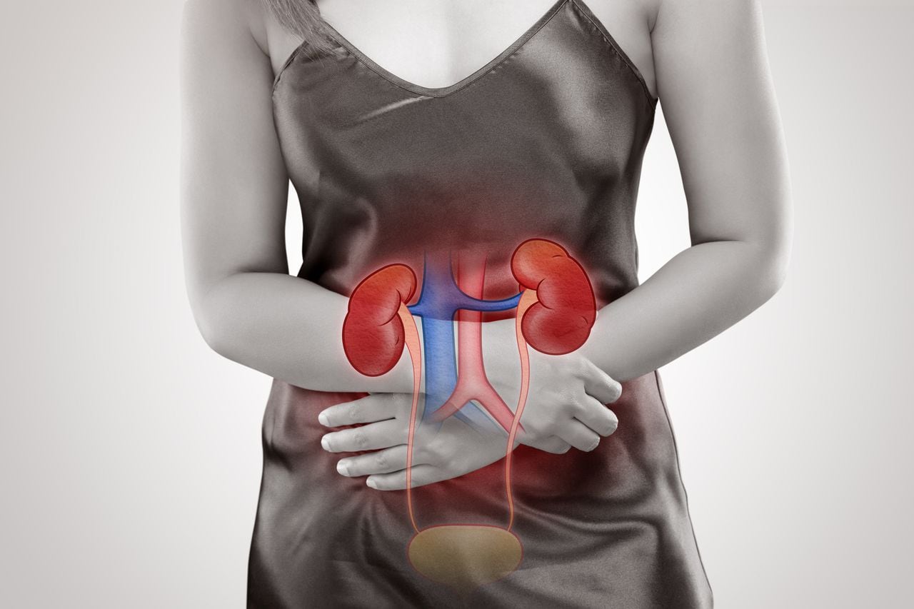 The woman has Kidney disease and Stomach ache, On gray background