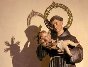 Statue in the Church of Saint Nicholas and Saint Peter Martyr in Valencia, Spain, of Saint Anthony of Padua holding Baby Jesus