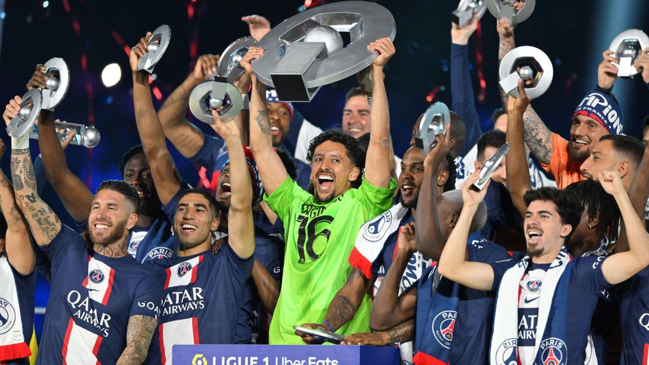 PARIS, FRANCE - JUNE 03: MARQUINHOS and players of Paris Saint-Germain lift the Ligue 1 Uber Eats trophy after the Ligue 1 match between Paris Saint-Germain and Clermont Foot at Parc des Princes Stadium in Paris, France on June 03, 2023. (Photo by Mustafa Yalcin/Anadolu Agency via Getty Images)